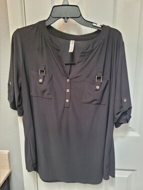 Black PerSeption Women's short sleeve top with 3/4 length sleeves and pockets